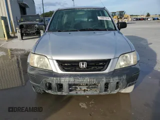1999 Honda CR-V LX with VIN JHLRD2844XC016583, listed as a Copart auction lot 73747274 with 104,730 mi miles and Salvage Title. Bid and sale history available at carsss.com. Image 5.