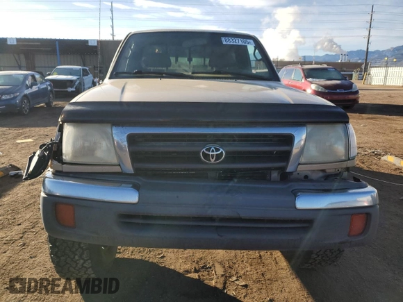 1999 Toyota Tacoma with VIN 4TAPM62N0XZ546880, listed as a Copart auction lot 88327105 with 234,164 mi miles and Salvage Title. Bid and sale history available at DreamBid. Image 5.