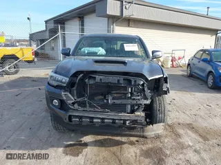 2023 Toyota Tacoma 4WD SR with VIN 3TMCZ5AN8PM574766, listed as a IAAI auction lot 40663003 with 43,978 mi miles. Bid and sale history available at carsss.com. Image 6.