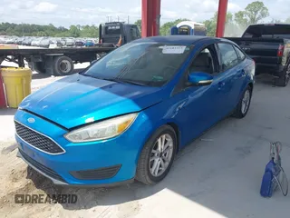 2015 Ford Focus SE with VIN 1FADP3F2XFL354354, listed as a IAAI auction lot 42183319 with 102,232 mi miles and . Bid and sale history available at carsss.com. Image 2.