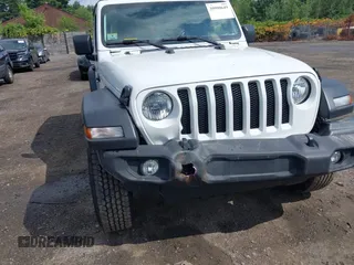 2019 Jeep Wrangler Sport S z VIN 1C4GJXAG0KW583315, wystawiony jako IAAI lot #39990649 z przebiegiem 32 768 mil mil oraz . Historia ofert i sprzedaży dostępna na DreamBid. Obrazek 6.