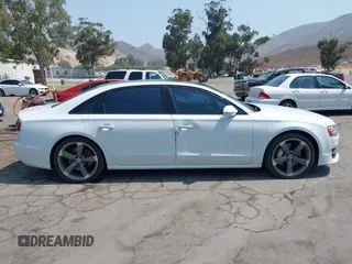 2017 Audi A8 Sport with VIN WAU43AFD3HN010445, listed as a IAAI auction lot 42714864 with 106,748 mi miles and . Bid and sale history available at DreamBid. Image 14.