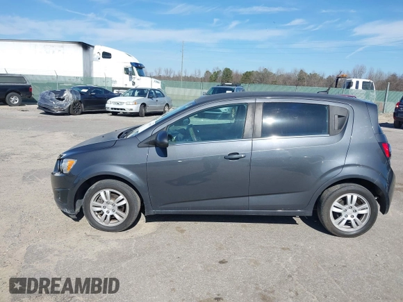 2013 Chevrolet Sonic LT with VIN 1G1JC6SB1D4164944, listed as a IAAI auction lot 41496975 with 96,987 mi miles. Bid and sale history available at carsss.com. Image 12.