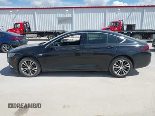 2018 Buick Regal Essence with VIN W04GP6SX5J1120700, listed as a IAAI auction lot 42334588 with 131,926 mi miles and . Bid and sale history available at DreamBid. Image 14.