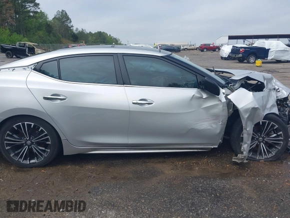 2016 Nissan Maxima SV z VIN 1N4AA6AP1GC904065, wystawiony jako IAAI lot #41930372 z przebiegiem 172 376 mil mil oraz . Historia ofert i sprzedaży dostępna na DreamBid. Obrazek 14.