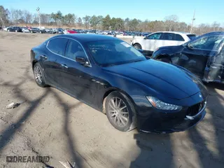 2014 Maserati Ghibli S Q4 with VIN ZAM57RTA1E1091738, listed as a IAAI auction lot 41518359 with 75,641 mi miles. Bid and sale history available at carsss.com. Image 1.