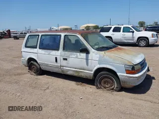 1992 Dodge Caravan z VIN 2B4GH2538NR700137, wystawiony jako IAAI lot #42011426 z przebiegiem 222 723 mil mil oraz . Historia ofert i sprzedaży dostępna na DreamBid. Obrazek 1.