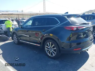 2017 Mazda CX-9 Grand Touring with VIN JM3TCBDY0H0130671, listed as a IAAI auction lot 42514237 with 81,016 mi miles and . Bid and sale history available at DreamBid. Image 3.