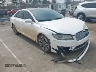 2017 Lincoln MKZ Reserve z VIN 3LN6L5EC2HR613827, wystawiony jako IAAI lot #41800613 z przebiegiem 199 097 mil mil oraz . Historia ofert i sprzedaży dostępna na DreamBid. Obrazek 1.