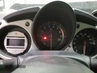 2010 Nissan 370Z Touring с VIN JN1AZ4FH9AM304066, выставлен на аукционе Copart как лот 84176404 с пробегом Не указан миль и На запчасти • Non repairable. История ставок и продаж доступна на DreamBid. Изображение 9.