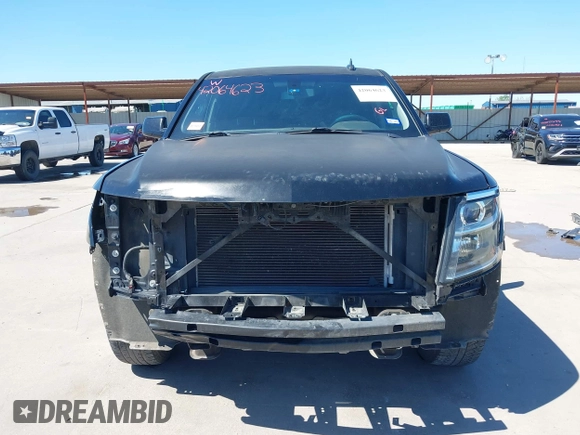 2015 Chevrolet Tahoe LS with VIN 1GNSCAKC5FR645736, listed as a IAAI auction lot 42064623 with 223,149 mi miles and . Bid and sale history available at DreamBid. Image 6.
