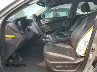 2013 Kia Optima EX z VIN KNAGM4AD3D5057004, wystawiony jako Copart lot #56042015 z przebiegiem 129 626 mil mil oraz Szkoda całkowita • Salvage title. Historia ofert i sprzedaży dostępna na DreamBid. Obrazek 7.