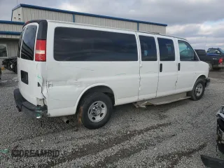 2014 Chevrolet Express Passenger LT with VIN 1GAZG1FG9E1108950, listed as a Copart auction lot 45370685 with 537,650 mi miles and Salvage title. Bid and sale history available at DreamBid. Image 3.