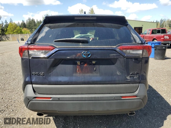2024 Toyota RAV4 Hybrid XLE Premium with VIN JTMB6RFV7RD129471, listed as a Copart auction lot 53905745 with 8,869 mi miles and Salvage Title. Bid and sale history available at carsss.com. Image 6.