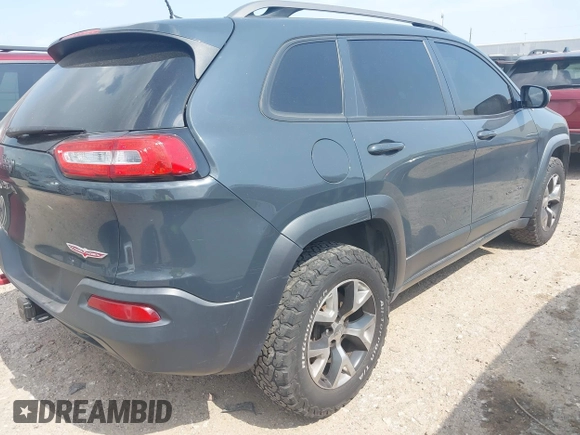 2016 Jeep Cherokee Trailhawk z VIN 1C4PJMBS0GW300131, wystawiony jako IAAI lot #42439009 z przebiegiem 173 571 mil mil oraz . Historia ofert i sprzedaży dostępna na DreamBid. Obrazek 4.