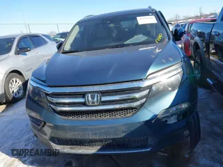 2016 Honda Pilot Elite with VIN 5FNYF6H04GB060786, listed as a IAAI auction lot 41335550 with 152,863 mi miles. Bid and sale history available at carsss.com. Image 12.