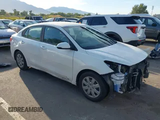 2022 Kia Rio S with VIN 3KPA24AD4NE498600, listed as a IAAI auction lot 40527357 with 59,614 mi miles. Bid and sale history available at carsss.com. Image 1.