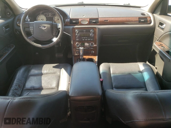 2008 Ford Taurus Limited with VIN 1FAHP28W38G117020, listed as a Copart auction lot 76197234 with 112,027 mi miles and Salvage Title. Bid and sale history available at carsss.com. Image 8.
