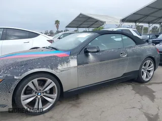 2007 BMW 6 Series 650i with VIN WBAEK13507CN81020, listed as a IAAI auction lot 42167743 with 127,552 mi miles and . Bid and sale history available at carsss.com. Image 14.