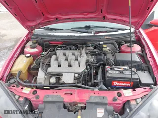 1999 Mercury Cougar with VIN 1ZWHT61L5X5629944, listed as a IAAI auction lot 41589590 with 90,999 mi miles. Bid and sale history available at carsss.com. Image 10.