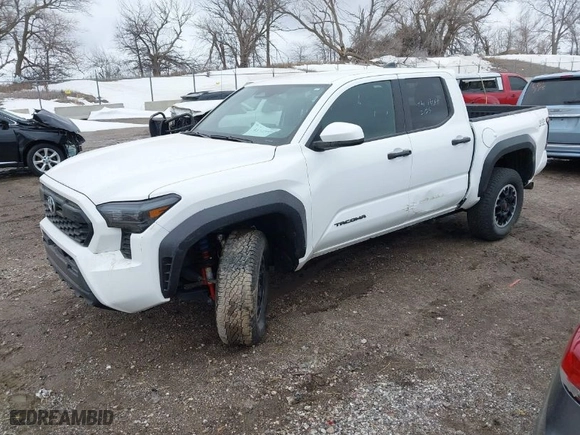 2024 Toyota Tacoma 4WD SR5 with VIN 3TMLB5JN2RM001031, listed as a IAAI auction lot 41743995 with 15,009 mi miles. Bid and sale history available at carsss.com. Image 2.