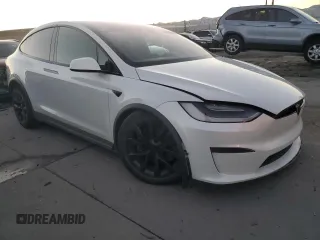 2022 Tesla Model X Plaid with VIN 7SAXCBE67NF356567, listed as a Copart auction lot 43243895 with 24,381 mi miles and Salvage Title. Bid and sale history available at DreamBid. Image 4.