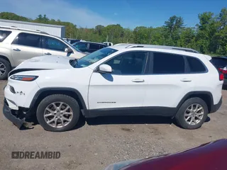 2017 Jeep Cherokee Latitude with VIN 1C4PJMCB6HW520731, listed as a IAAI auction lot 42299903 with 132,527 mi miles and . Bid and sale history available at DreamBid. Image 14.