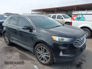 2020 Ford Edge Titanium z VIN 2FMPK3K92LBB24713, wystawiony jako IAAI lot #41949412 z przebiegiem 97 014 mil mil oraz . Historia ofert i sprzedaży dostępna na DreamBid. Obrazek 1.