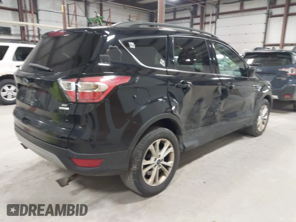 2017 Ford Escape SE with VIN 1FMCU0GD7HUB92091, listed as a IAAI auction lot 41984845 with 192,021 mi miles and . Bid and sale history available at DreamBid. Image 4.