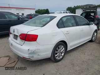 2012 Volkswagen Jetta SE with VIN 3VWDP7AJ7CM314675, listed as a IAAI auction lot 42270474 with 164,437 mi miles and . Bid and sale history available at DreamBid. Image 4.