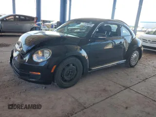 2014 Volkswagen Beetle 2.5L with VIN 3VWJX7AT4EM608445, listed as a Copart auction lot 73750164 with 60,202 mi miles and Salvage title. Bid and sale history available at DreamBid. Image 1.