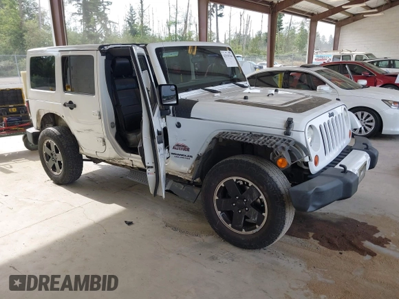 2012 Jeep Wrangler Unlimited Sahara with VIN 1C4BJWEG7CL275883, listed as a IAAI auction lot 42510764 with 149,531 mi miles and . Bid and sale history available at DreamBid. Image 1.