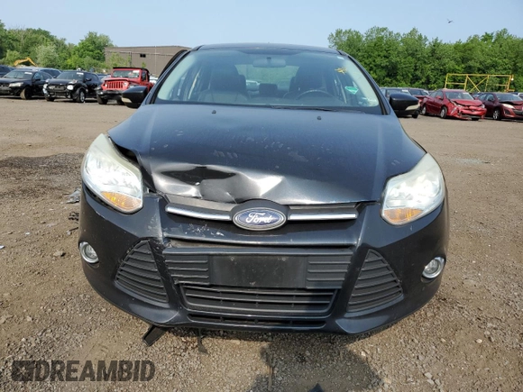 2013 Ford Focus SE with VIN 1FADP3F21DL280156, listed as a Copart auction lot 59814185 with 103,252 mi miles and Salvage title. Bid and sale history available at DreamBid. Image 5.