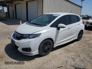 2018 Honda Fit Sport z VIN 3HGGK5G67JM710514, wystawiony jako Copart lot #52434545 z przebiegiem 47 403 mil mil oraz Czysty tytuł • Clean title. Historia ofert i sprzedaży dostępna na DreamBid. Obrazek 1.