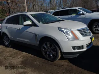 2013 Cadillac SRX Premium Collection z VIN 3GYFNJE38DS642169, wystawiony jako IAAI lot #41429015 z przebiegiem 122 333 mil mil oraz . Historia ofert i sprzedaży dostępna na DreamBid. Obrazek 1.