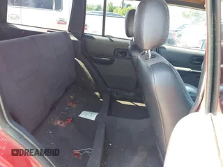 1999 Jeep Cherokee Sport with VIN 1J4FT68S1XL504294, listed as a IAAI auction lot 42509063 with 225,661 mi miles and . Bid and sale history available at DreamBid. Image 8.