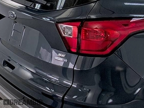 2019 Ford Escape SE z VIN 1FMCU9GD9KUA54757, wystawiony jako IAAI lot #42516631 z przebiegiem 87 040 mil mil oraz . Historia ofert i sprzedaży dostępna na DreamBid. Obrazek 4.