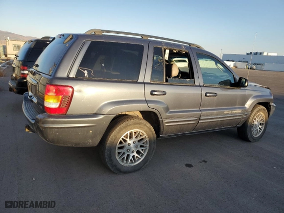 2003 Jeep Grand Cherokee Limited with VIN 1J4GW58N03C561385, listed as a Copart auction lot 75777094 with 169,705 mi miles and Salvage Title. Bid and sale history available at carsss.com. Image 3.