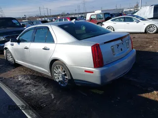 2010 Cadillac STS AWD with VIN 1G6DU6EV8A0120484, listed as a IAAI auction lot 41528974 with 89,489 mi miles and . Bid and sale history available at carsss.com. Image 3.