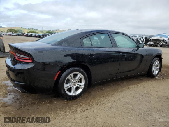 2022 Dodge Charger SXT with VIN 2C3CDXBGXNH200640, listed as a Copart auction lot 54198465 with 72,022 mi miles and Clean Title. Bid and sale history available at DreamBid. Image 3.