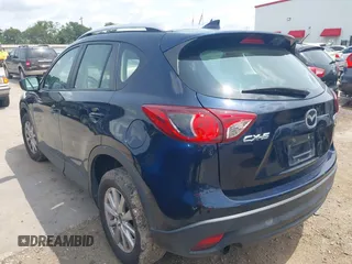 2016 Mazda CX-5 Sport z VIN JM3KE2BY0G0633611, wystawiony jako IAAI lot #42390654 z przebiegiem Nie podano mil oraz . Historia ofert i sprzedaży dostępna na DreamBid. Obrazek 3.