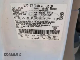 2011 Ford Escape Hybrid z VIN 1FMCU5K36BKB48839, wystawiony jako Copart lot #69024034 z przebiegiem 110 100 mil mil oraz Czysty tytuł • Clean title. Historia ofert i sprzedaży dostępna na DreamBid. Obrazek 13.