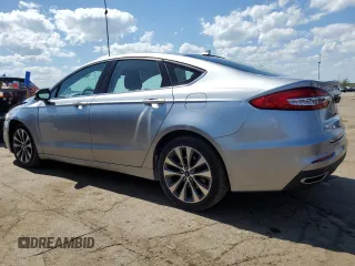 2020 Ford Fusion SE z VIN 3FA6P0T93LR179435, wystawiony jako Copart lot #56985465 z przebiegiem 43 188 mil mil oraz Szkoda całkowita • Salvage title. Historia ofert i sprzedaży dostępna na DreamBid. Obrazek 2.