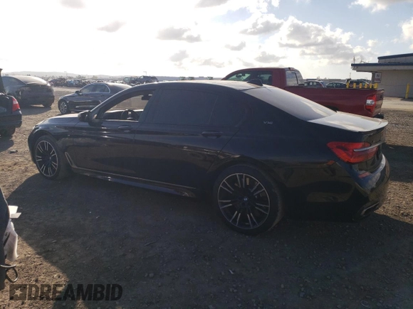 2018 BMW 7 Series M760i xDrive with VIN WBA7H6C50JG614781, listed as a Copart auction lot 83689234 with 49,873 mi miles and Salvage Title. Bid and sale history available at carsss.com. Image 2.