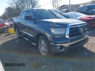2010 Toyota Tundra with VIN 5TFEY5F14AX086790, listed as a IAAI auction lot 41589849 with 176,201 mi miles and . Bid and sale history available at DreamBid. Image 1.