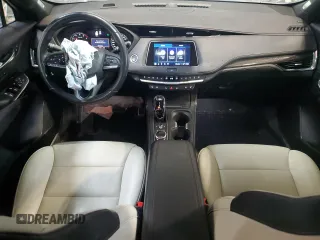 2023 Cadillac XT4 AWD Sport z VIN 1GYFZFR47PF153453, wystawiony jako Copart lot #56988695 z przebiegiem 67 533 mil mil oraz Szkody całkowita. Historia ofert i sprzedaży dostępna na DreamBid. Obrazek 8.