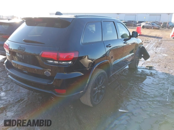 2019 Jeep Grand Cherokee Laredo E with VIN 1C4RJFAG0KC546365, listed as a IAAI auction lot 41664891 with 160,640 mi miles. Bid and sale history available at carsss.com. Image 4.