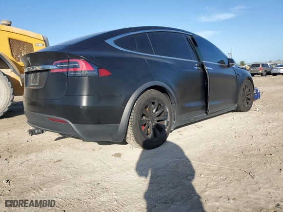 2017 Tesla Model X P100D with VIN 5YJXCBE4XHF040743, listed as a Copart auction lot 74010904 with NaN miles and Salvage Title. Bid and sale history available at carsss.com. Image 3.