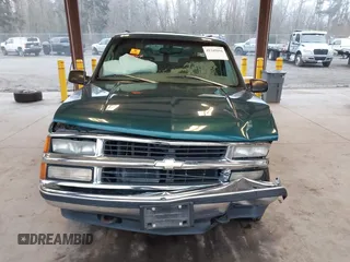 1997 Chevrolet Suburban with VIN 3GNFK16R6VG118242, listed as a IAAI auction lot 41349416 with 183,439 mi miles. Bid and sale history available at carsss.com. Image 12.