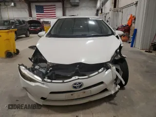 2014 Toyota Prius One z VIN JTDKDTB33E1558853, wystawiony jako Copart lot #57339425 z przebiegiem Nie podano mil oraz Nie do naprawy • Non repairable. Historia ofert i sprzedaży dostępna na DreamBid. Obrazek 5.